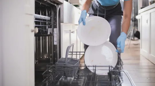 Team Member Loading Dishwasher