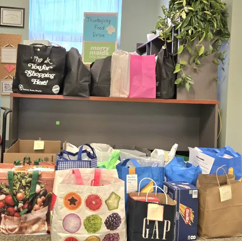 merry maids doing a food drive for thanksgiving