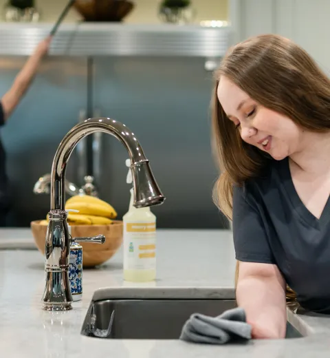 Team Members Cleaning a Kitchen